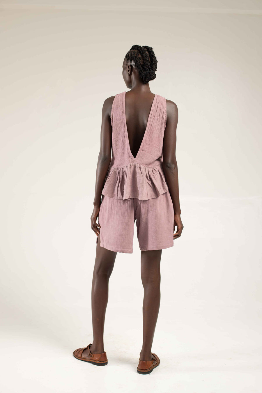 Sleeveless peplum Musk