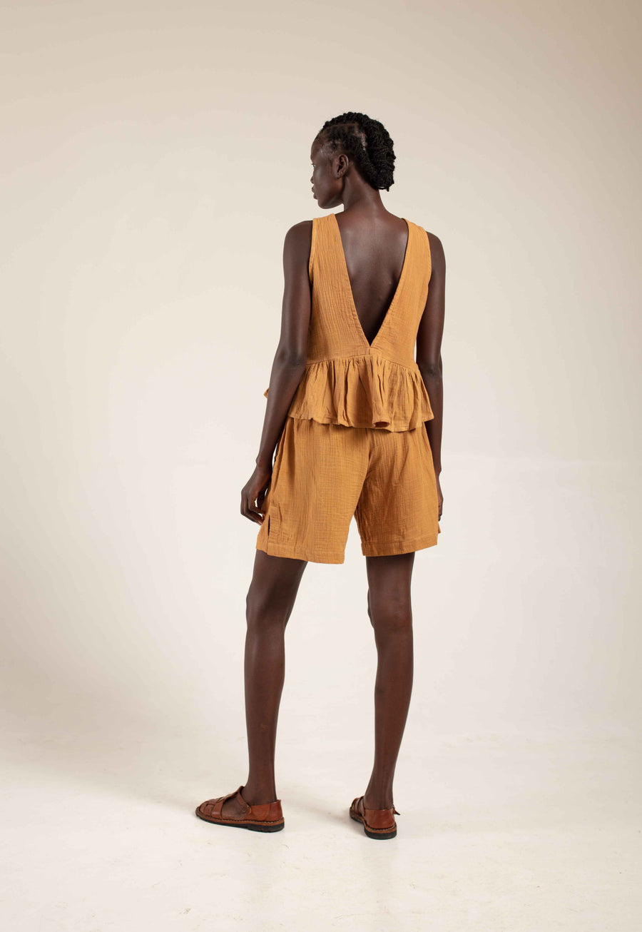 Sleeveless peplum Ginger